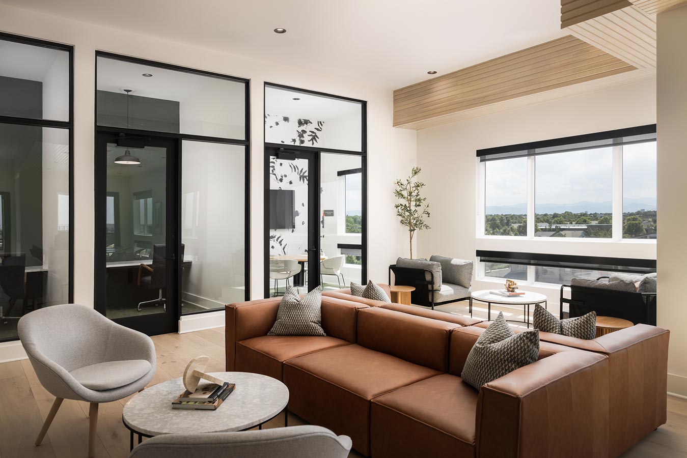 Clubhouse area with business office and large windows for natural lighting