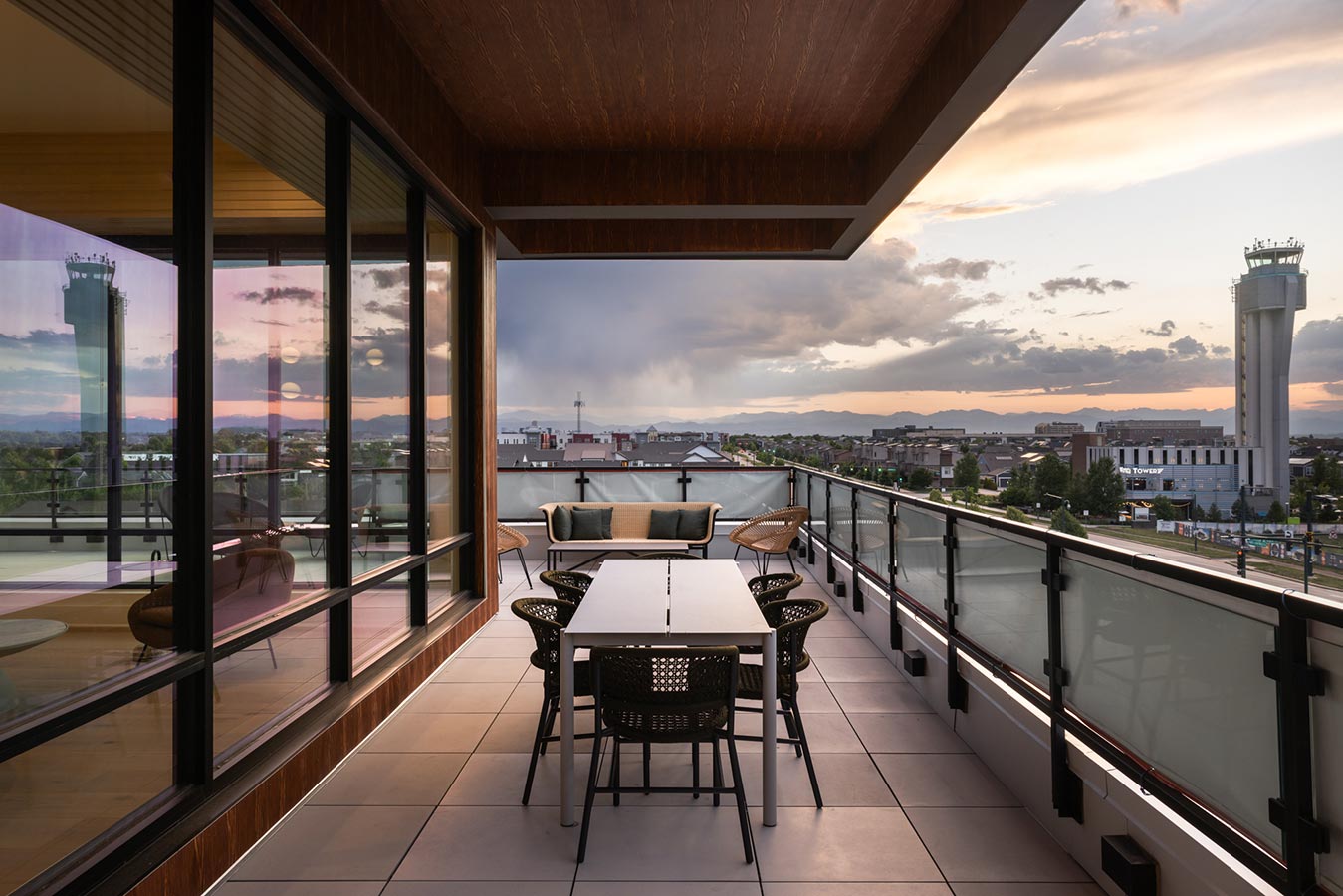 View from rooftop with table and chairs