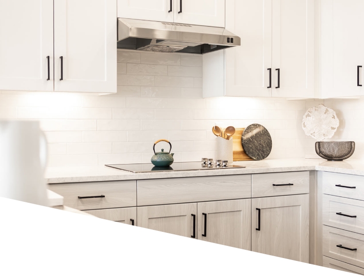 Modern white cabinet kitchen at RYE Central Park luxury apartments in Denver, CO